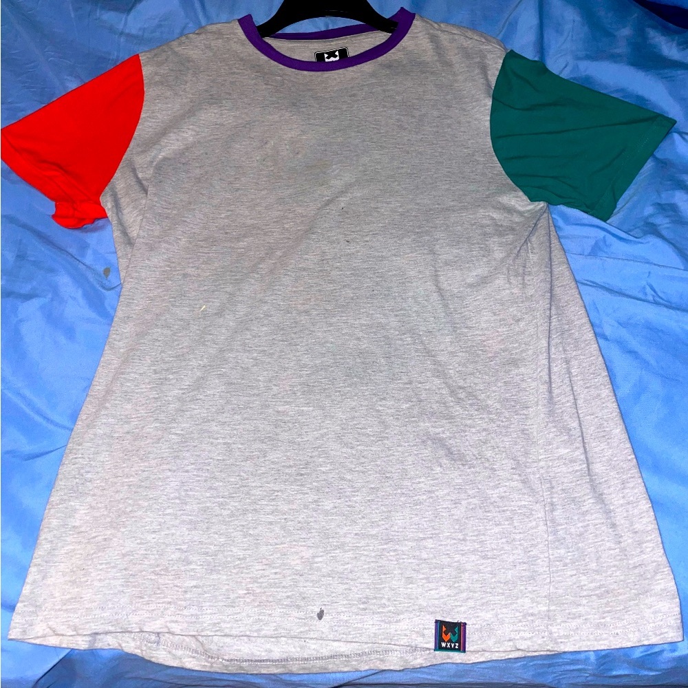 Shirt with red and green shoulders